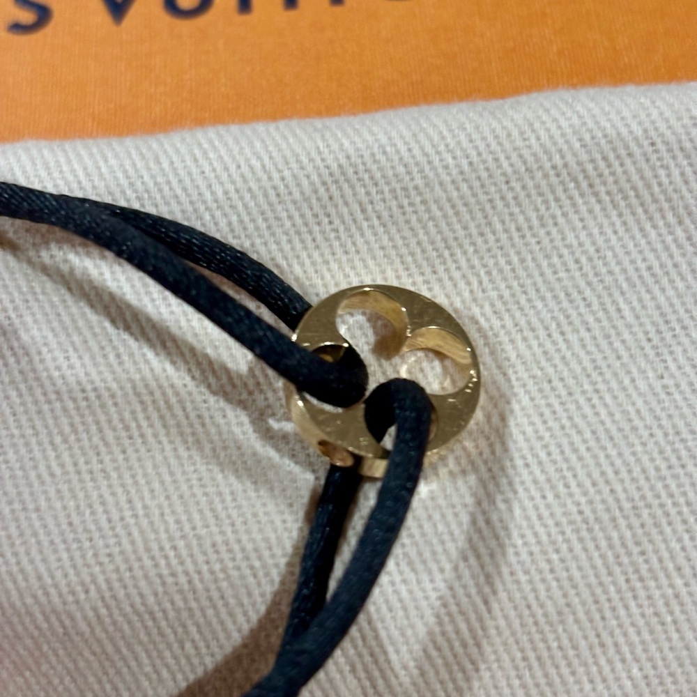 Louis Vuitton Black Cord Bracelet 18k with Yellow Gold Monogram Flower charm - Picture 3 of 5